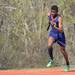 Ypsilanti's Charles Spratt races down the track during the boy's 4 by 200 relay event at the Golden Triangle boys and girls track meet at Saline High School, Friday, May 3.
Courtney Sacco I AnnArbor.com